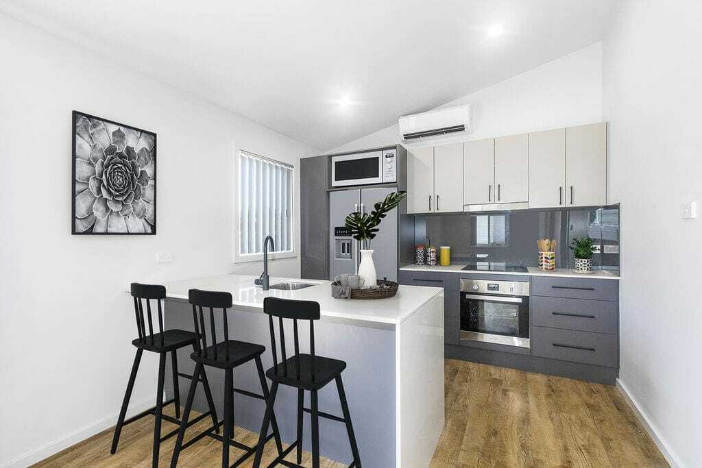 backyard-grannys-114-medcalfe-warners-bay-kitchen-from-the-living-room